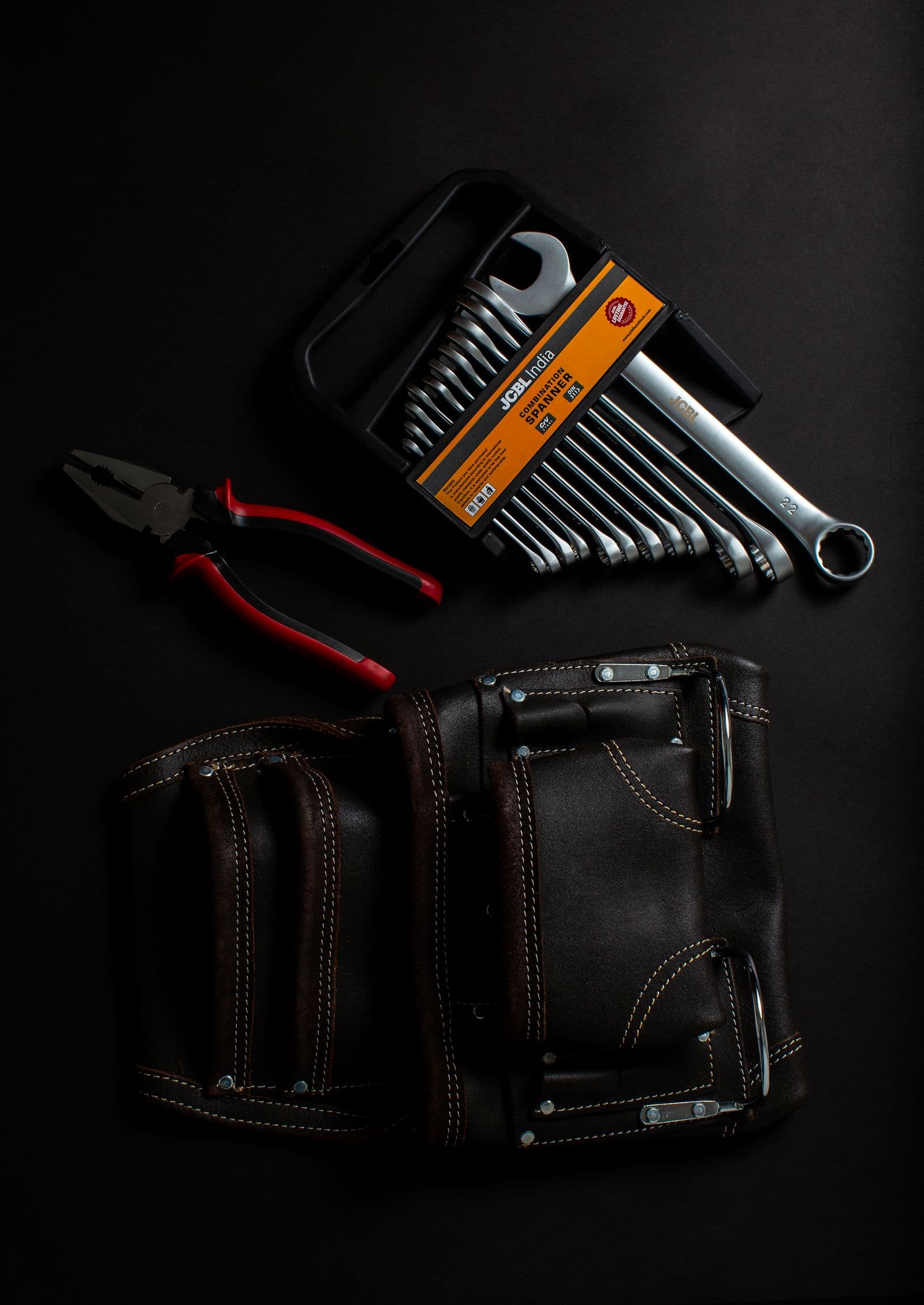 Quality hand tools and a leather tool belt ready for the job
